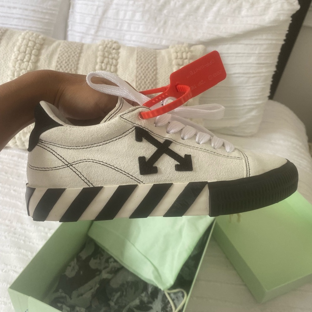 Off-white sneakers. Brand new wore once but they are too small for me.